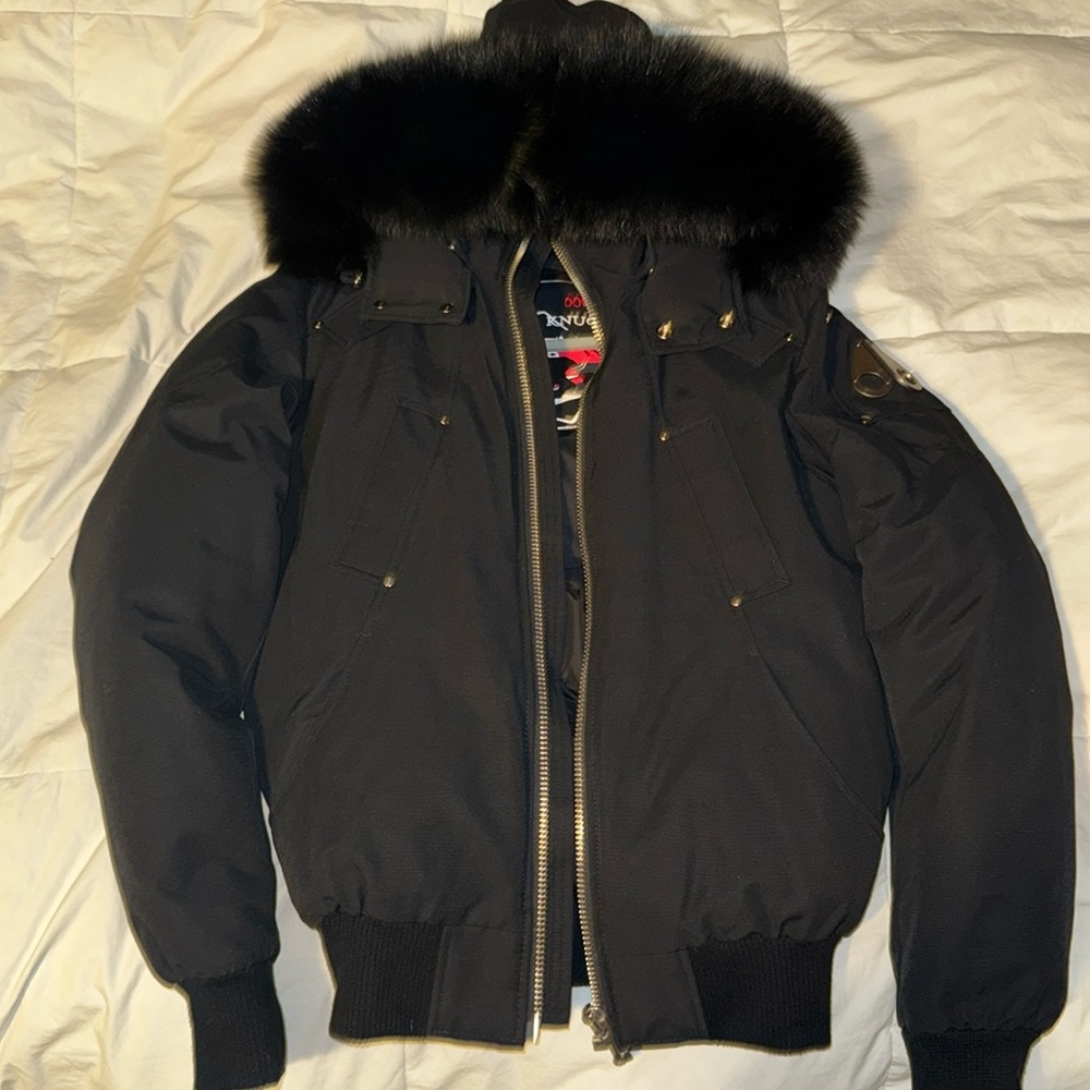 Men’s black Moose Knuckles jacket size XS, fits like a woman’s small.